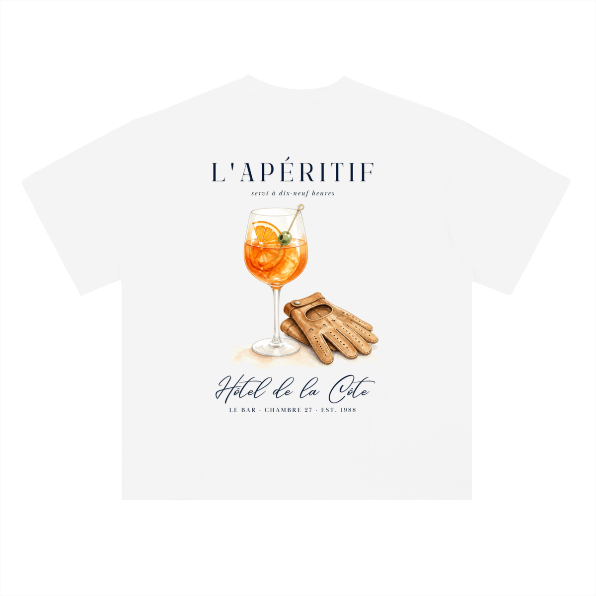 L’Apéritif French Riviera T-Shirt in Lucent White, a relaxed-fit tee for car and racing fans, back view: orange spritz and driving gloves under L’Apéritif lettering