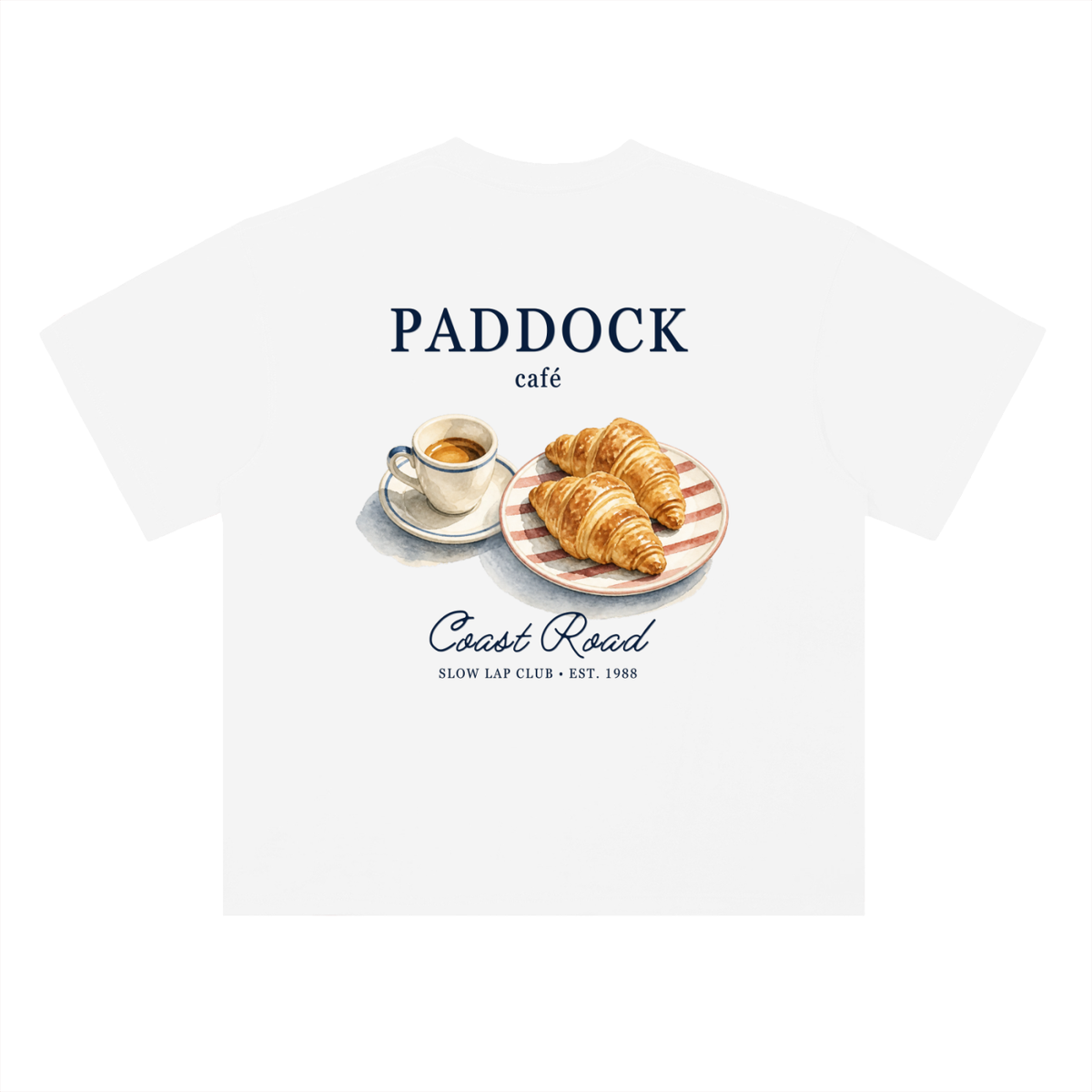 Paddock Café Racing Graphic T-Shirt in Lucent White, a relaxed-fit motorsport streetwear tee, back view: espresso and croissants under Paddock Café lettering