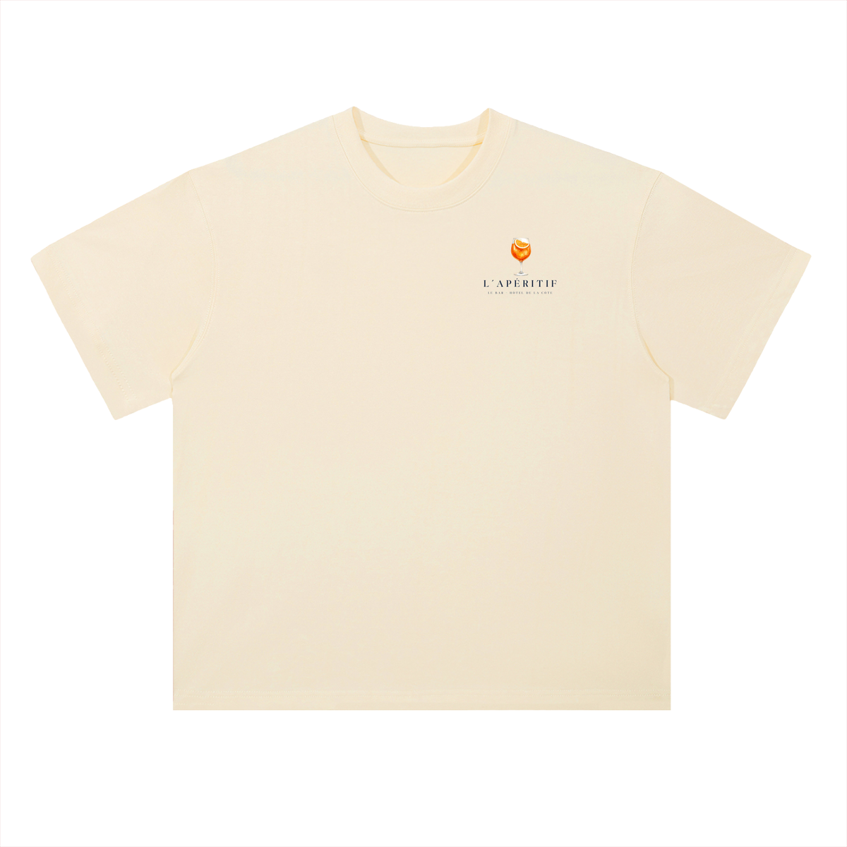 L’Apéritif French Riviera T-Shirt in Milk Apricot, a relaxed-fit tee for car and racing fans, front view: small spritz glass on the chest