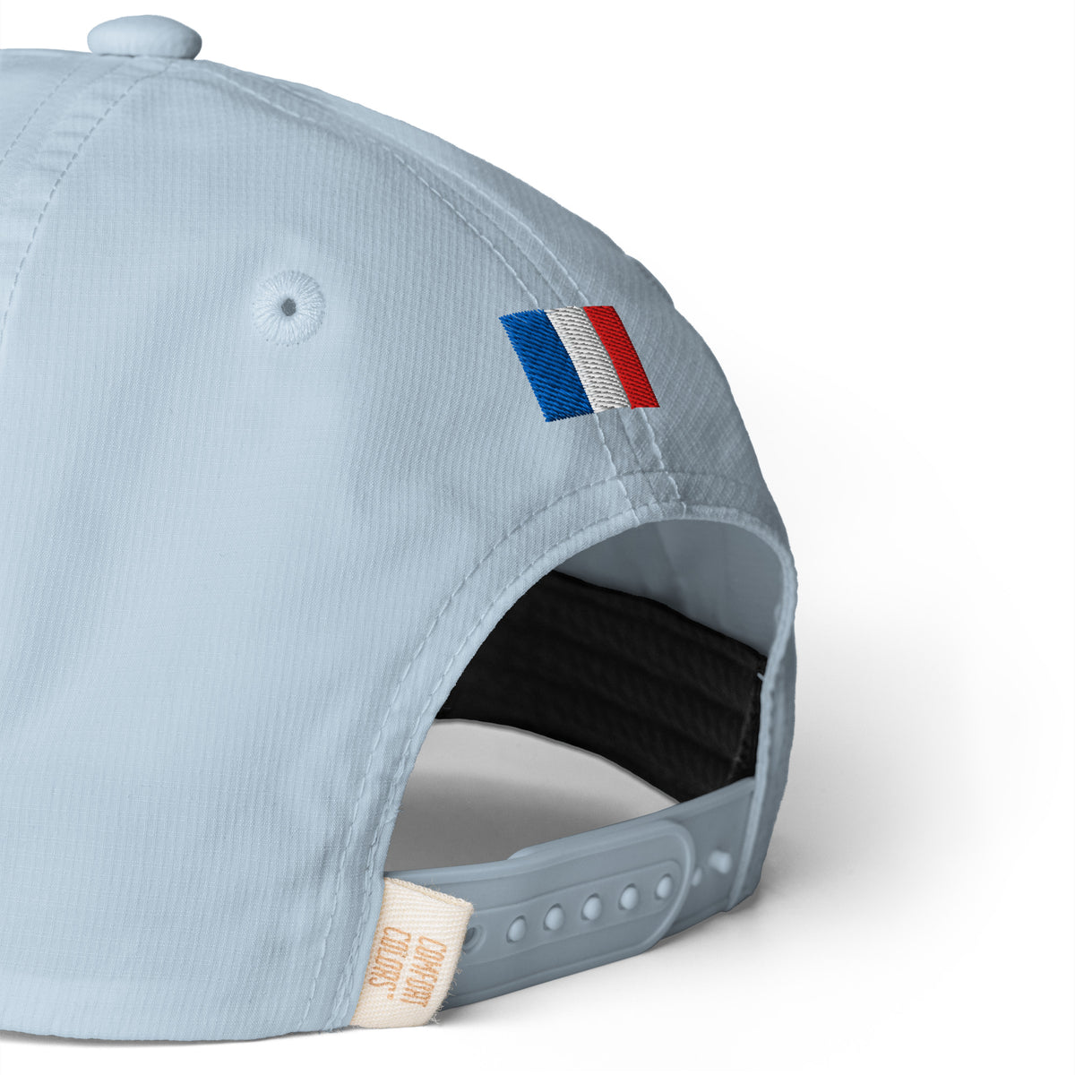 Côte Country Club Rope Hat in Light Blue, a vintage racing-style country club rope hat, back close-up view: embroidered flag and snapback